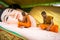 Ca Mau, Vietnam - Dec 6, 2016: Novices washing lying Buddha statue at Khmer Monivongsa Bopharam pagoda in Ca Mau city, South Vietn