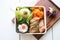 cabbage rolls packed for lunch in a bento box with salad