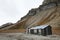 Cabin and cliffs in Skansbukta, Svalbard