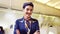 Cabin crew or air hostess working in airplane