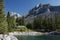 Cabin and Mountain on Lake Minnewanka