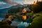 A cabin porch with rocking chairs and a view of a serene