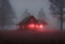 a cabin surrounded by fog