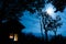 Cabin in the Woods lit with Moonlight