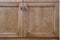 Cabinet facade with closed doors made of solid ash timber