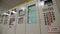 Cabinets with switchboards and buttons in control office