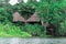 Cabins along the river in the Amazon