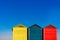 Cabins changers for bathers on a beach of the Mediterranean in summer, colored blue, yellow and red