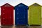 Cabins changers for bathers on a beach of the Mediterranean in summer, colored blue, yellow and red