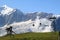 Cable-car against the white snowy Swiss mountains