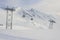 Cable car gondolas move skiers uphill at the ski resort, Grindelwald, Switzerland.