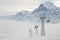 Cable car gondolas move skiers uphill at the ski resort in Grindelwald, Switzerland.