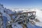 Cable car masts on a steep slope. Austrian Alps.