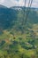 Cable car riding over mountain landscape. Travel adventures background