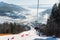 Cable car with skiers in Bukovel at sunny day