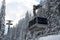 Cable car in snowy forest