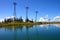 Cable car summit with blue sky and lake reflections