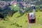 Cable car between the top of Manlichen Mountain and the village Wengen. Switzerland.