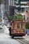 Cable car tram in San Francisco climbing up the street