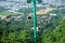 Cable cars carry people to the summit of Mount Cangshan