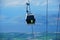 Cable cars carry people to the summit of Mount Cangshan