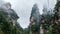 Cable cars among the foggy mountains