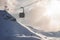 Cable cars over majestic snowcapped Bernese mountains under sky