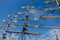 Cable ladders, mast and ropes of a sailing ship against the blue sky. Concept of travel, adventure and sea.