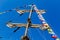 Cable ladders, mast and ropes of a sailing ship against the blue sky. Concept of travel, adventure and sea.