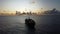 Cable ship sailing near Fiji at sunset