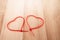 Cable ties heart shape on wood background , holiday abstract background