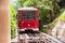 Cable train with passengers goes up the mountain