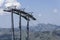 Cableway with idyllic summer mountains landscape