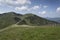 Cableway with idyllic summer mountains landscape