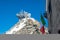 Cableway station Punta Helbronner in the blue sky  with Italian flag