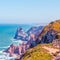 Cabo da roca, stunning views on blue turquoise ocean and purple rocks