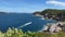 Cabo Frio, Rio de Janeiro - Brazil. Panoramic view from above - Praia da Concha, Coastal vegetation, mountains, waves hitting the