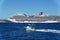 Cabo San Lucas, Mexico - November 7, 2022 - Carnival Cruise ship and a small boat sailing on the bay