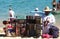 Cabo San Lucas, Mexico - November 7, 2022 - A local salesperson offering colorful jewelleries and dog collars for sale