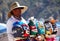 Cabo San Lucas, Mexico - November 7, 2022 - A local salesperson offering colorful mask for sale