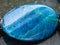 Cabochon from Kyanite gemstone on dark