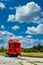 Caboose by Side of Tracks Under Sky