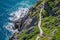 Cabot Trail with hikers staying in shape, walking along in St John\'s, Newfoundland.