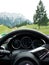 Cabriolet steering wheel perspective with alpine view