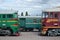 Cabs of modern Russian electric trains. Side view of the heads of railway trains with a lot of wheels and windows in the form of