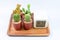 Cactus, Four different varieties of cactus in pots on wooden tray with c