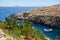 Cactus over water of Wied Zurrieq Fjord on south end of Malta is