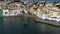 Cadaques Spain. Aerial drone video footage of the camera approaches the city sunny daylight. At the end of video footage