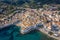 CAdaques Spain. Dali city. aerial top view from above. picturesque linen houses, tiled roofs and a church on the