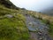 Cader Idris mountain with lake near the town of Dolgellau, in National Park Snowdonia in Wales, misty morning 2022